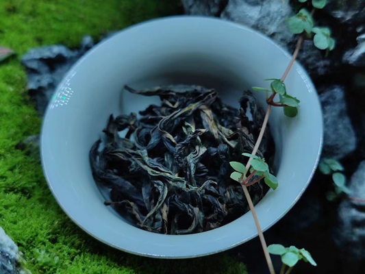 Jin Junmei caja de regalo enlatada de 80 g de té Wuyi flor de montaña de semillas pequeñas fábrica de té Lianyun mayorista
