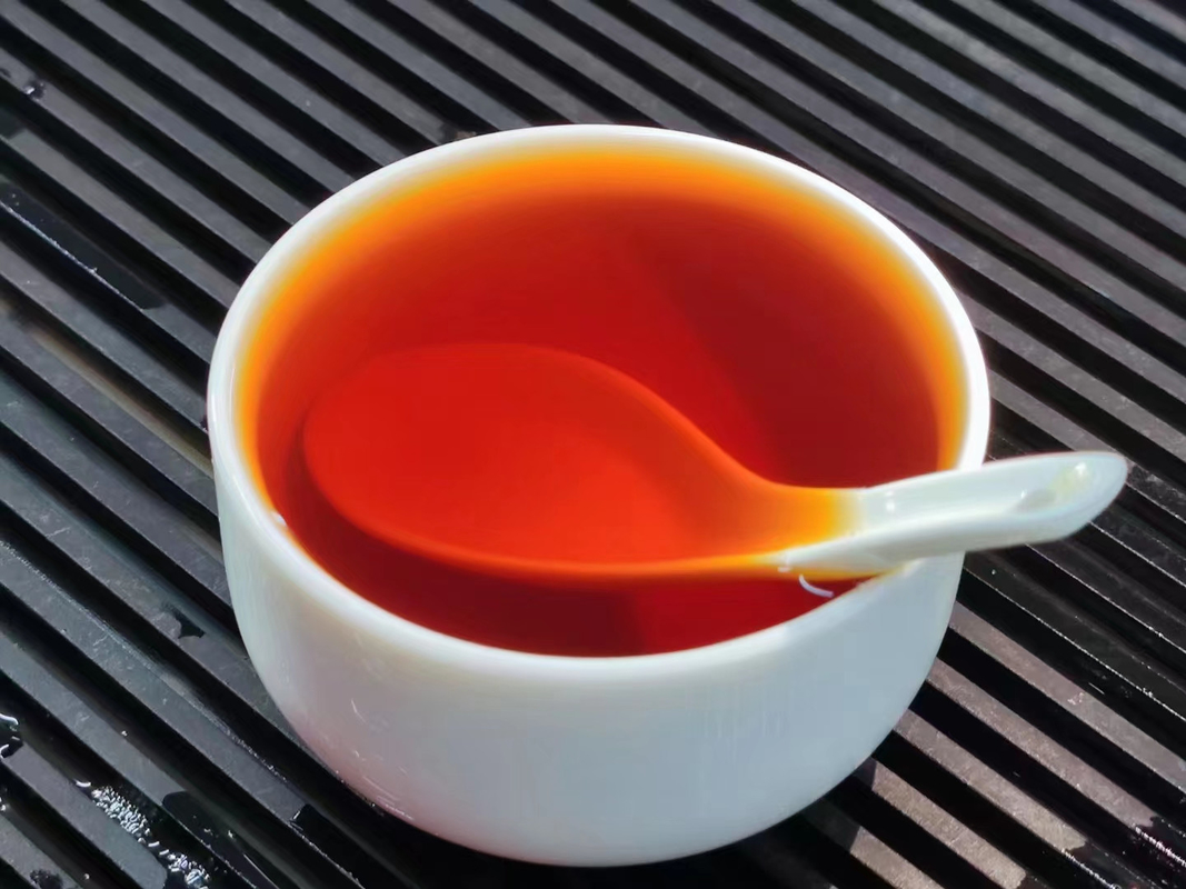 Jin Junmei caja de regalo enlatada de 80 g de té Wuyi flor de montaña de semillas pequeñas fábrica de té Lianyun mayorista